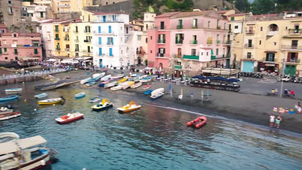 Aerial View of Beautiful Sorrento Beach and Port at Summer Sunset Amalfi Coast  Italy