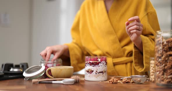 Woman Making Cereal Breakfast