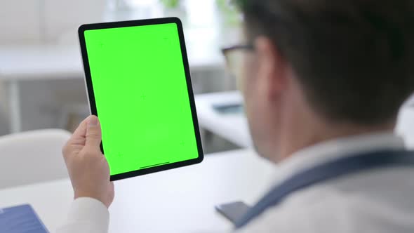 Doctor using Tablet with Green Chroma Screen