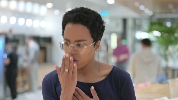 Portrait of Sick Casual African Woman Coughing