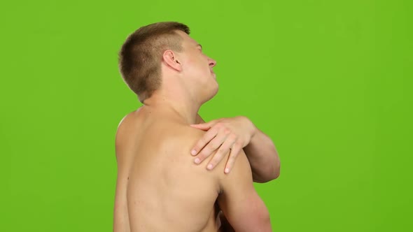 Man Suffering From Having Painful Cramps in Shoulder, Severe Pain