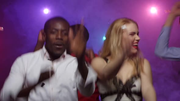 People of Different Nationalities Dancing at Party, Close-up Shift Camera