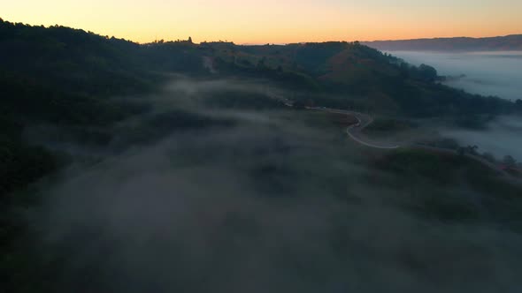 4K Aerial view from drone, amazing sunlight on high mountain peak.