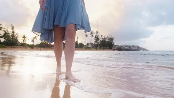 Caucasian Woman In Flattering Beach Dress Traveler Relaxing on Hawaii Islands