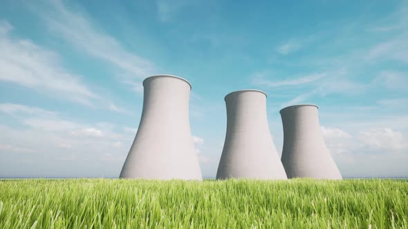 Three Towers Combined Heat and Power Plant on Green Grass Field Nature Landscape