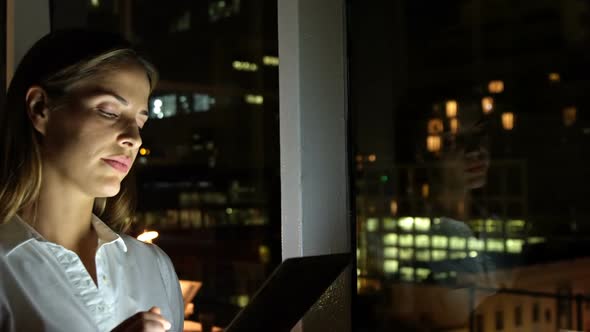 Businesswoman using digital tablet