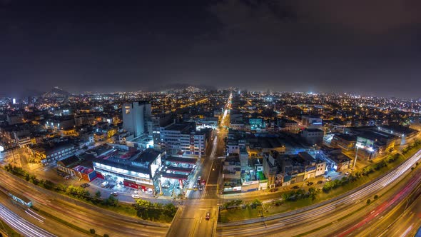 Panoramic Skyline of Lima City From Above with Many Buildings Aerial Night Timelapse