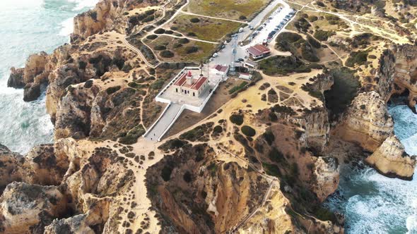 Ponta da Piedade Lighthouse, cliff formations along coastline of Lagos, Algarve, Portugal