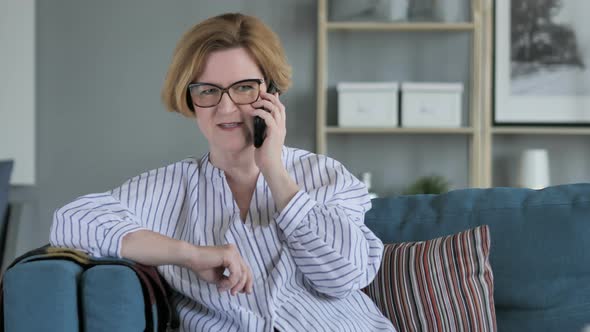 Old Woman Talking on Phone