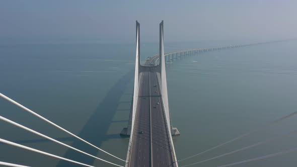 Lisbon Portugal Aerial View of the Vasco Da Gama Bridge on a Foggy Beautiful Morning During Car