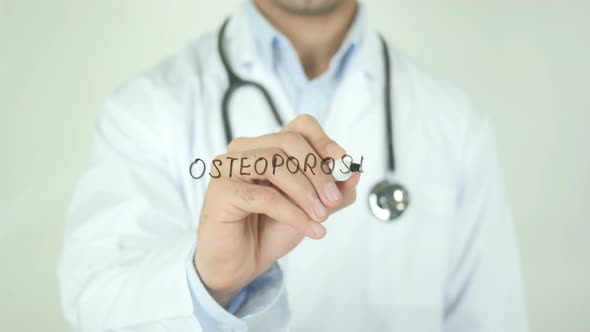 Osteoporosis, Doctor Writing on Transparent Screen