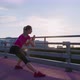 Sportswoman is Training in Urbanistic Landscape Doing Morning Exercises - VideoHive Item for Sale