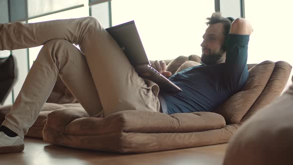 Peaceful Boss Feeling No Stress Lounging Dreaming On Workplace. Comfortable Sofa In Office.