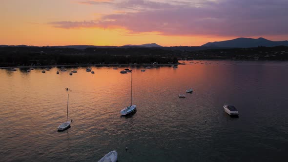 Magical sunset twilight sky above Salo city and lake Garda, Italy.  Aerial view of idyllic scenery a