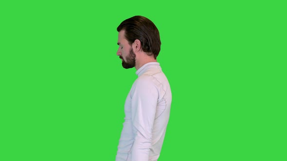 Handsome Guy Workout Exercising with Dumbbell on a Green Screen Chroma Key