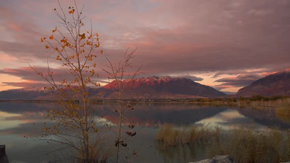 Timpanogos Mountain reflecting in Utah Lake at sunset