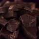 Chocolate. Chunks of dark chocolate rotate on dark background, rotate. - VideoHive Item for Sale