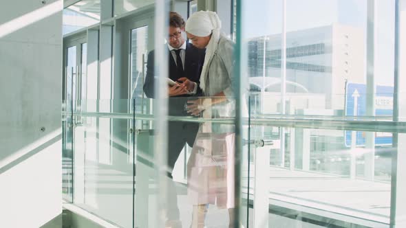 Young business people talking in a modern office