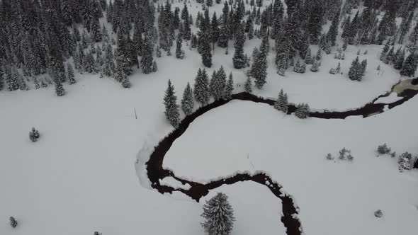 Drone shot of the Jizera Stream, flowing through the Jizera Mountains in the Czech Republic. 