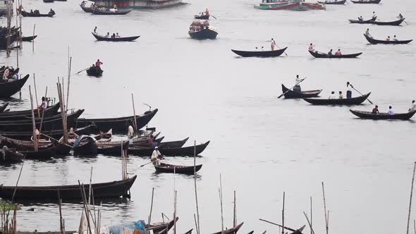 Time lapse of boats going back and forth in Buriganga River in Dhaka, Bangladesh