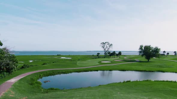 Flyover over of a bayside golf course