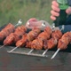 Man Turning Barbecue Grill Meat Outdoors - VideoHive Item for Sale