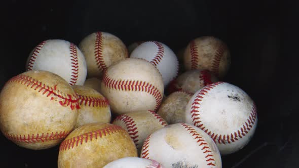 Macro Shot Through Group of Baseball Balls 