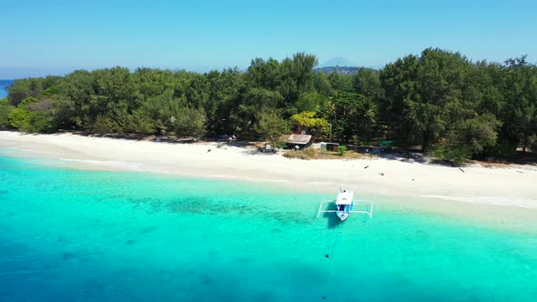 Beautiful drone abstract view of a white sandy paradise beach and aqua blue water background in best