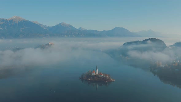 Lake Bled, Slovenia on a beautiful foggy morning in Spring.