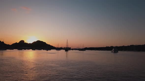 Aerial View on Lipari Islands with Trees, Buildings and Mountains. Moored Vessels. Mediterranean Sea