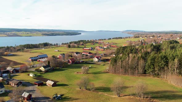 Lakeside Farm Houses And Buildings Near Swedish Woodlands Countryside Near Ostersund, Sweden. 4K Dro