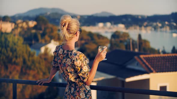 Lady Relaxing Leisure Celebrating Holidays Vacation Sunset. Woman Drinking White Wine.