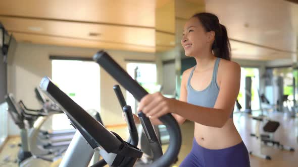 Woman run on treadmill in gym