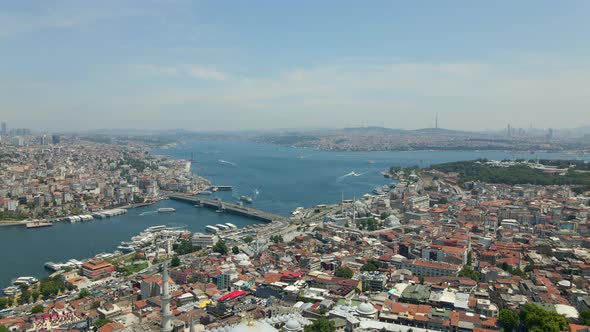 Flying over Istanbul towards Galata Bridge and junction