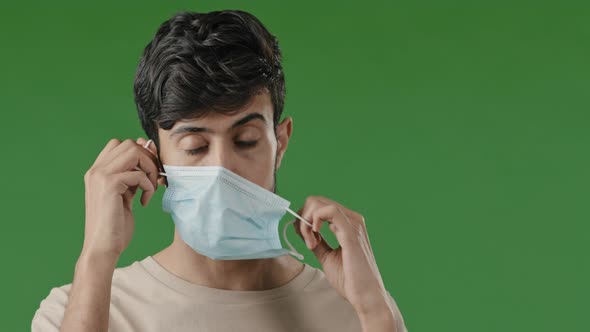 Portrait Millennial Exhausted Brunette Man Patient Arab Guy Student Stand on Green Background Take