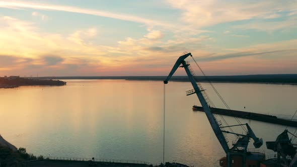 Industrial Port at Sunset Located Near a River