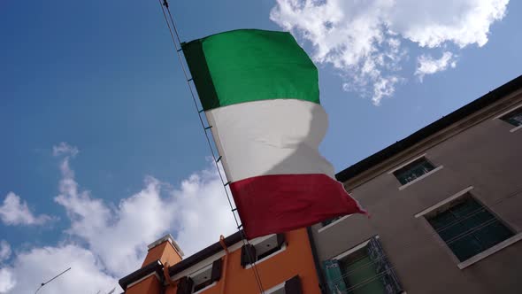 Italian Flag Waving Near the Venetian Houses