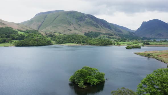 Lake Disctrict Crummock Water drone pan around Scale Island