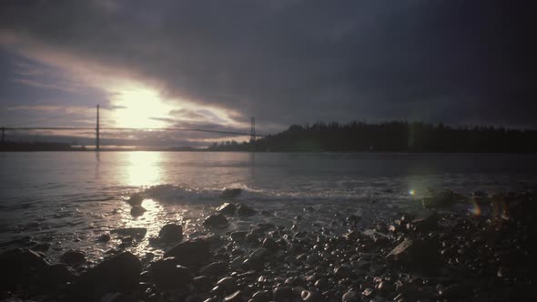 Calm morning ocean, Lions gate bridge in background