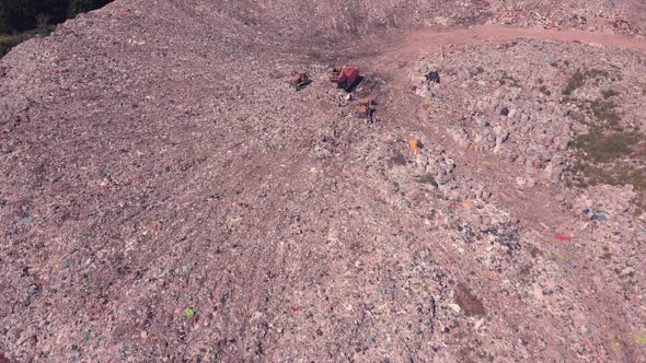 Technician Flying Over Landfill Equals Mountains of Household Waste, Ukraine. Environmental Problem