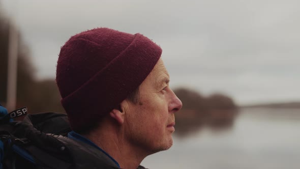 Closeup Portrait of Man Tourist Looking at Lake in Himmelbjerget Area Denmark
