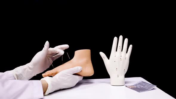 Doctor Video Footage - A Person Holding An Artificial Foot