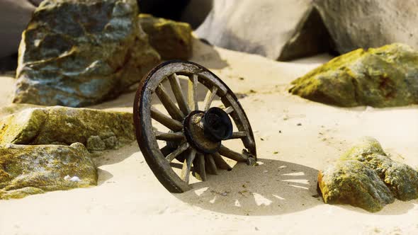 Old Tradition Waggon Wheel on the Sand