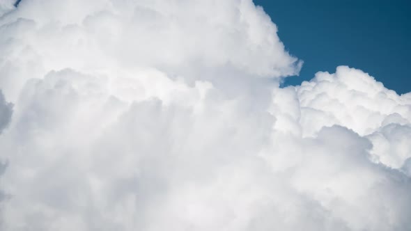 Timelapse of fluffy clouds alt