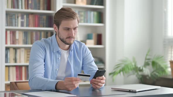 Man Having Online Payment Success on Smartphone