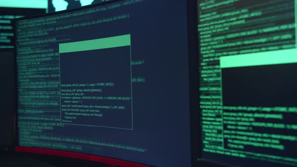 Code On Multiple Computer Screens, Cyber Attack