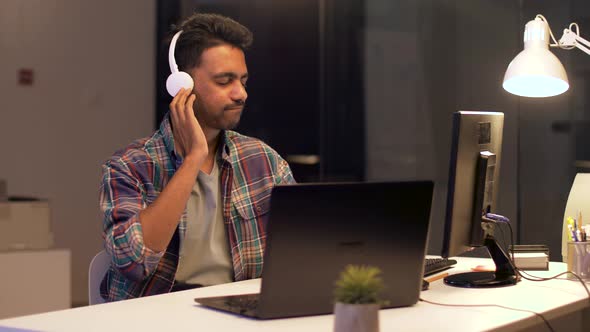 Man in Headphones Working with Computers at Office 30