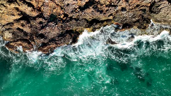 Texture of the rocky beach aerial view 4 K Turkey Alanya