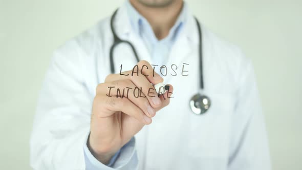Lactose Intolerance, Doctor Writing on Transparent Screen