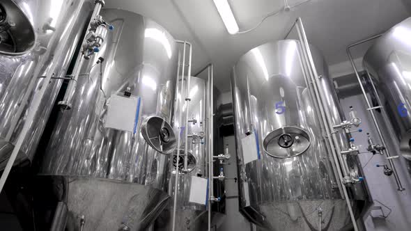 Metal Cisterns for Mashing Malt for Beer Are Standing in Shop of Industrial Brewery, Round Panoramic